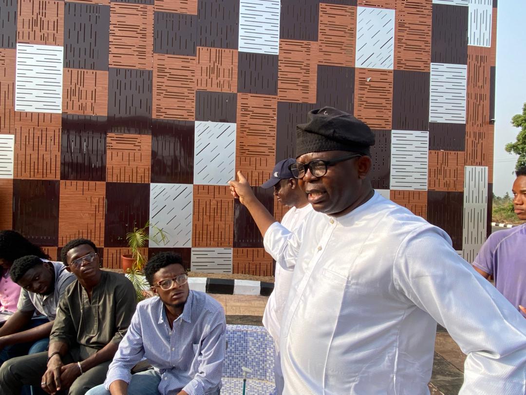 Stakeholders discussing the centre's progress.